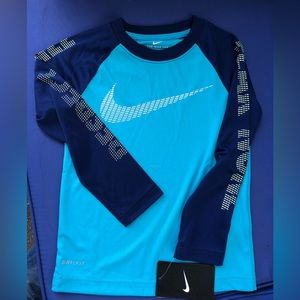 Boys Nike dry fit long sleeve tee.  Size 4 and 5 . Color: chlorine blue